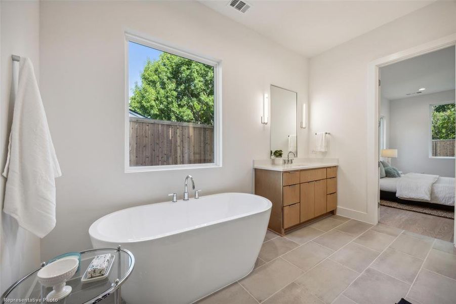 Primary bathroom with soaking tub on 1st level