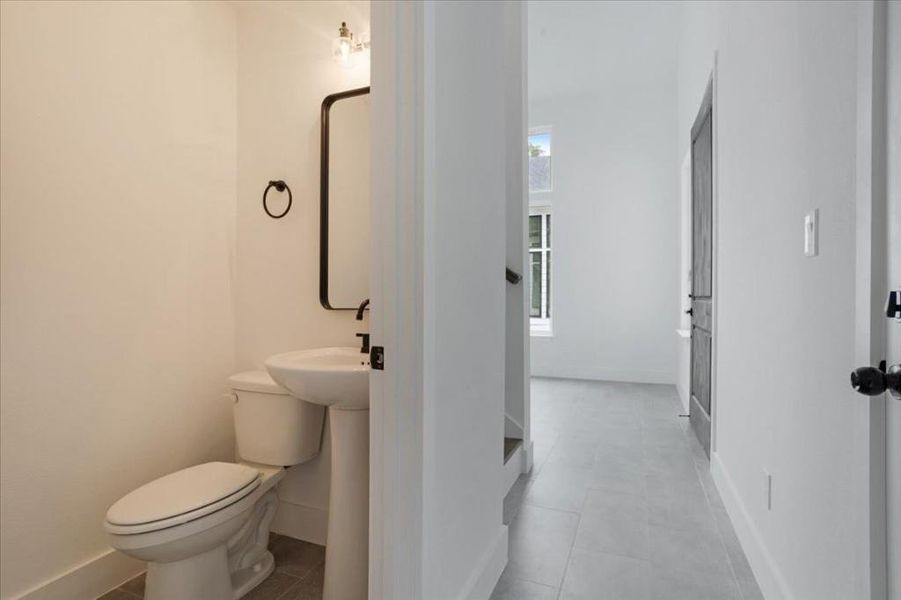 Bathroom with tile patterned floors