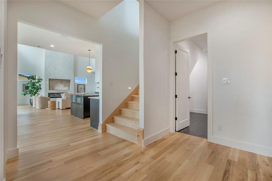 Stairs featuring wood-type flooring