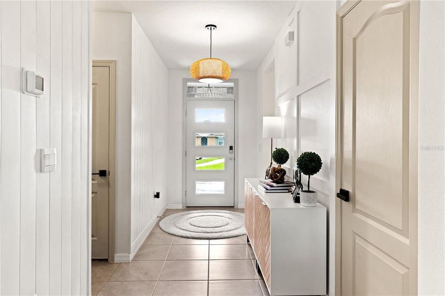 You are welcomed with this beautiful entryway with shiplap and customized walls.