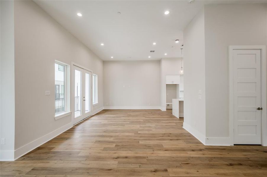 Expansive space for living and entertaining on the second level opens onto the balcony and kitchen area.