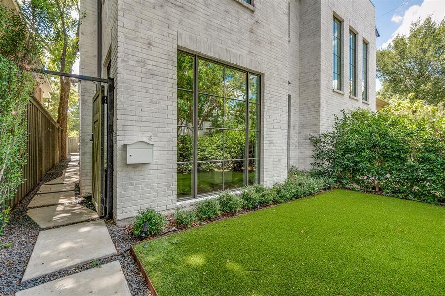 View of home's exterior featuring a lawn