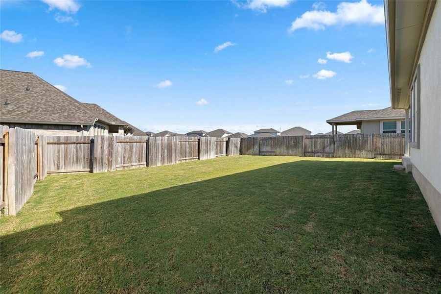 Nice and Level Yard with Sprinkler System.