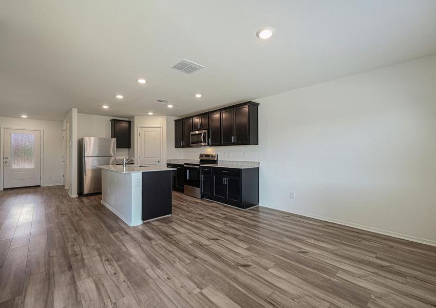 The spacious kitchen is perfect for preparing your family's favorite meals and treats.