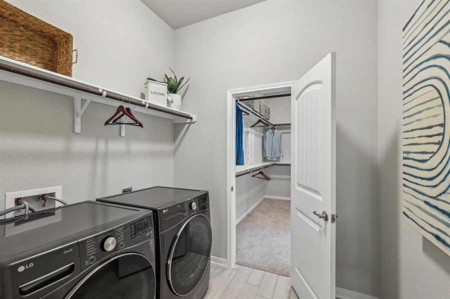 Laundry Room accessible from primary bedroom
