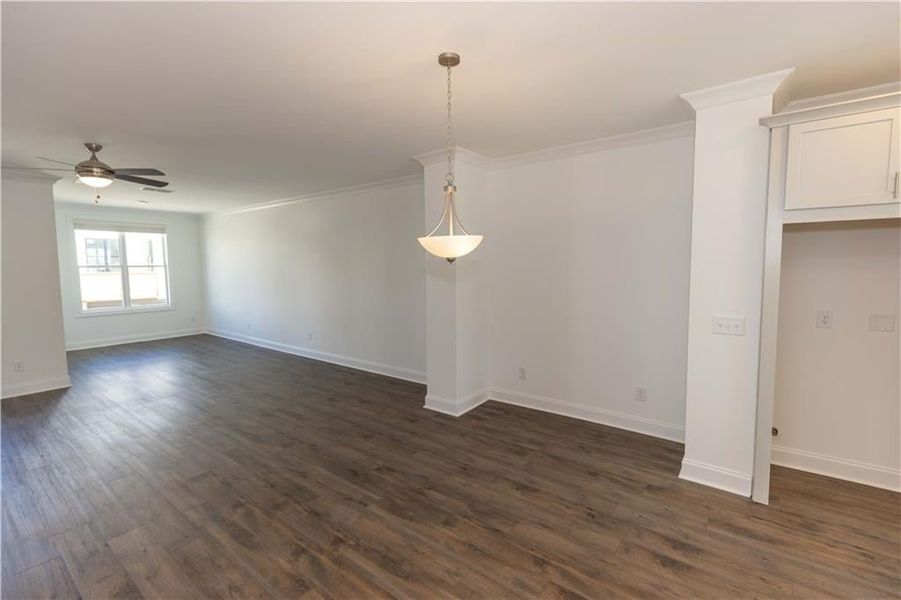 Dining area opens to the family room.**Photos of model house and not of actual home - Photos for representation purposes only **