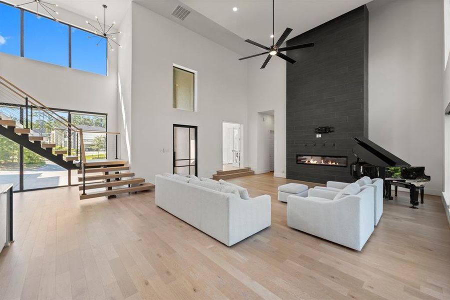 Beautiful flooring and the staircase is featured like a piece of artwork!