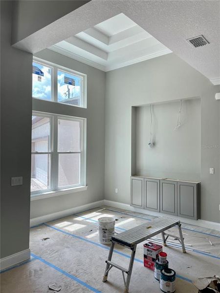 Dining room area with built in shelving.