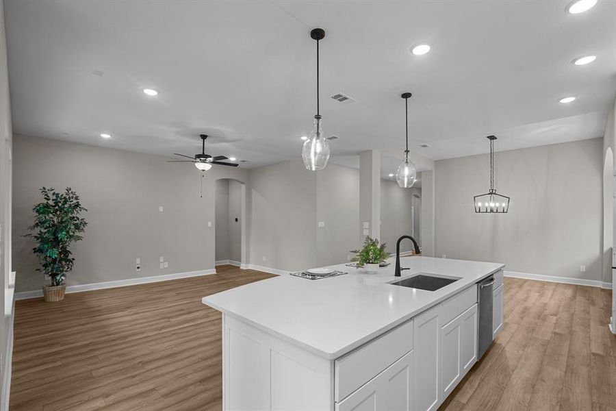 Large island/breakfast bar with quartz counters