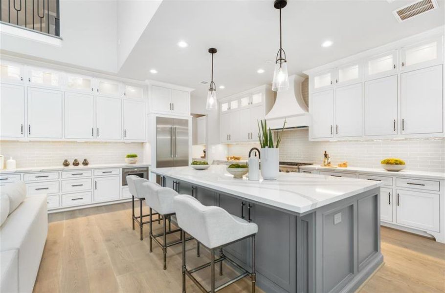 Kitchen in another home by the builder