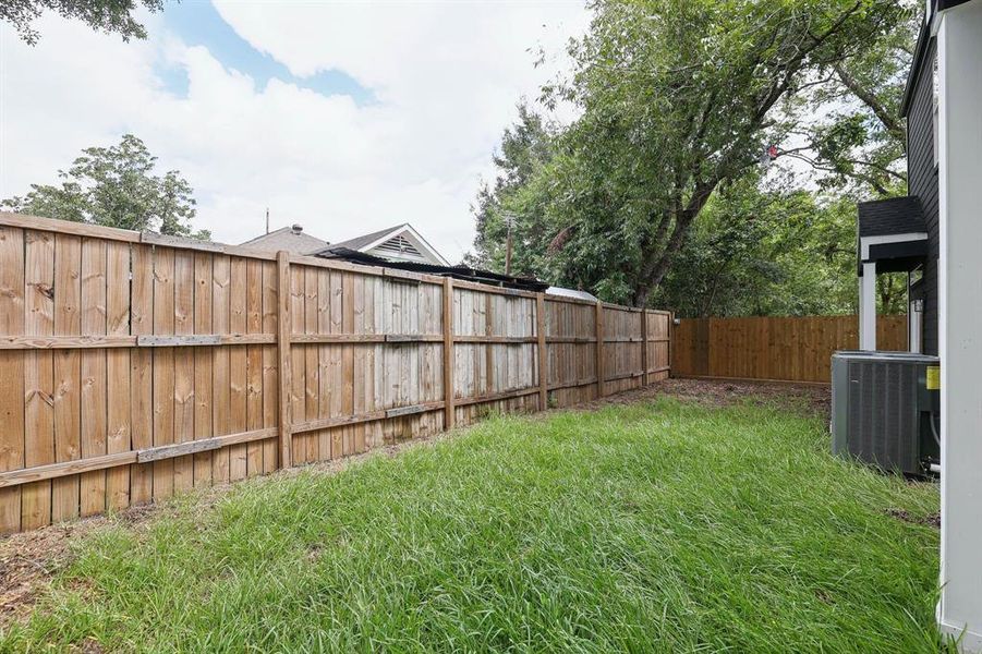 Backyard with brand new fence, perfect for pets!