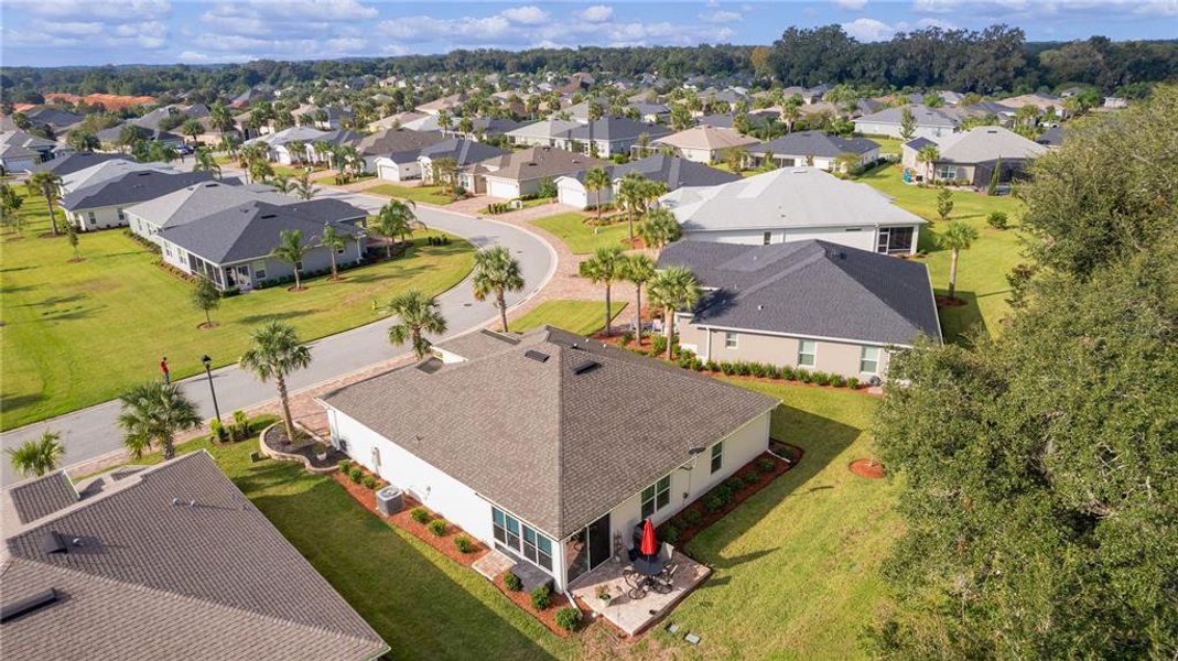 Lanai with Glass Windows and Glass Slider Walk Out to A Perfect sized Patio!