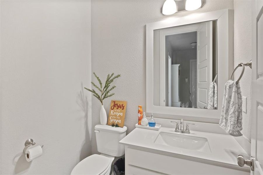 Bathroom with vanity and toilet