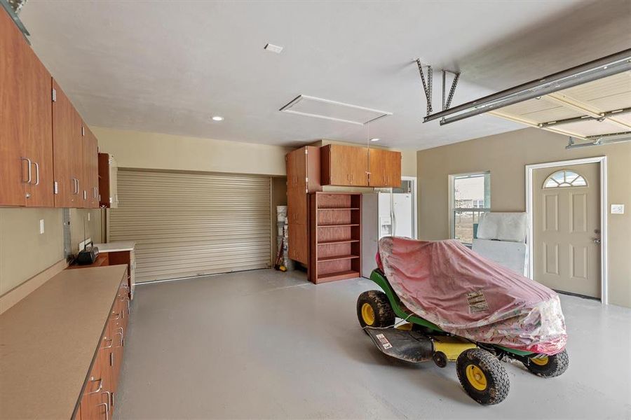 every man's dream--a garage with storage and it's own bathroom!