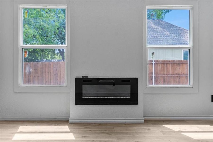 Interior details featuring hardwood / wood-style flooring