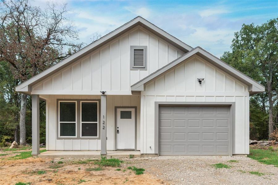 View of front of house with a garage