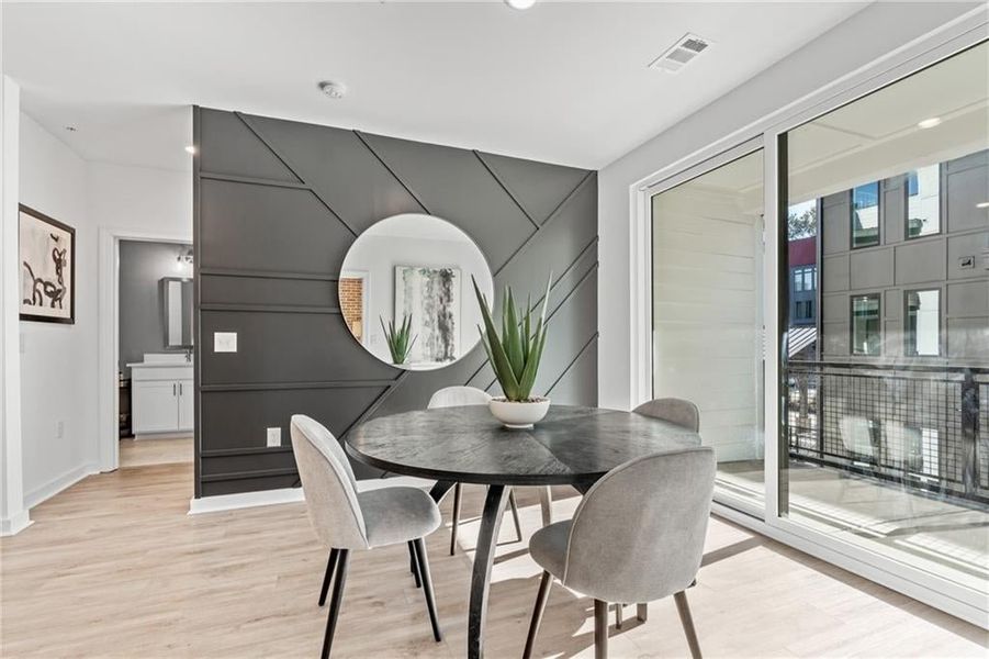 Dining area that will accommodate your dining room table. *Model Home-Representative purposes only*