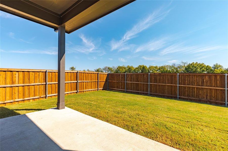 View of yard with a patio area