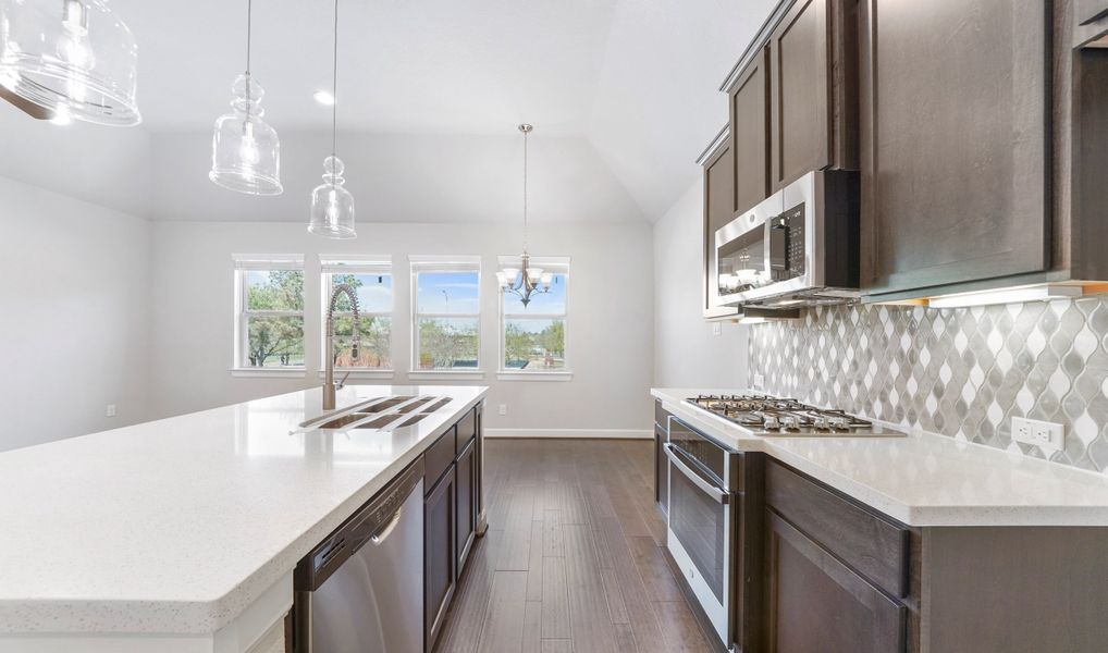 Gourmet kitchen with dining area