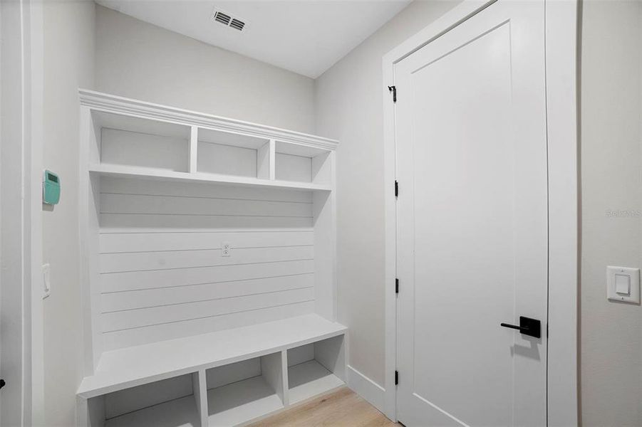 Laundry/Mudroom with custom built in