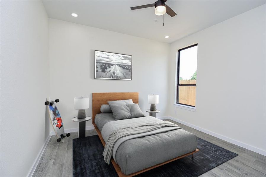 Second secondary bedroom with ample closet space, natural light, and a ceiling fan!