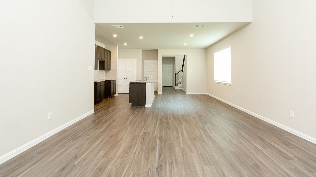 Family Room to Kitchen and Dining Area