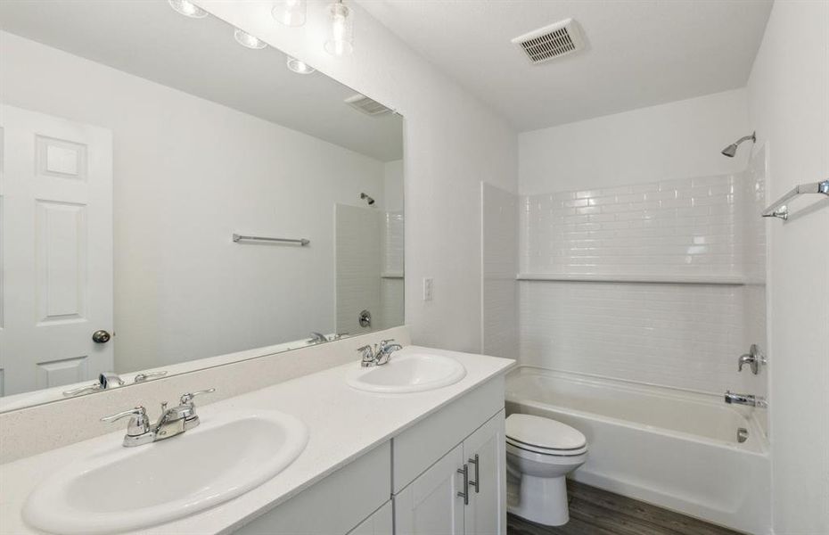 Upgraded secondary bathroom*real home pictured