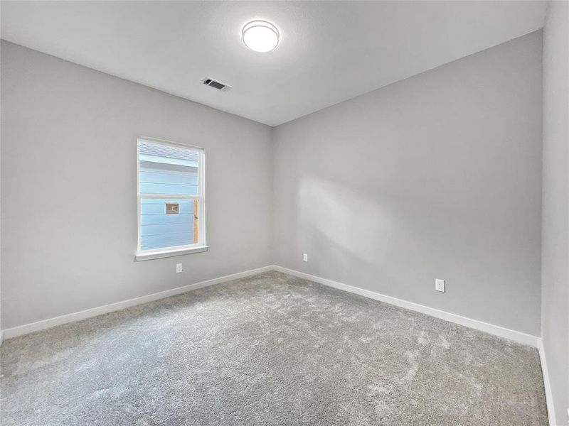 Empty room featuring carpet flooring