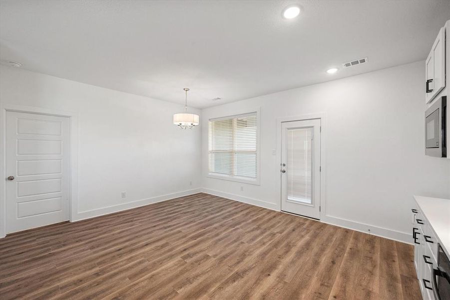 Dining area with decorative lighting