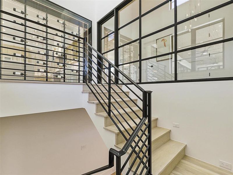 Stairs featuring wood-type flooring