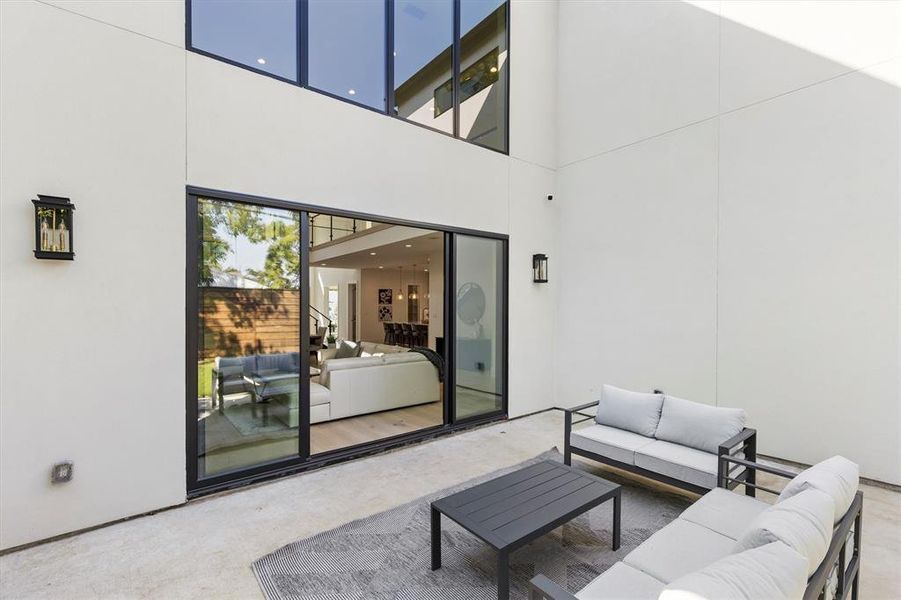 View of patio featuring an outdoor hangout area