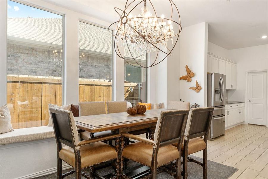 Dining area with a chandelier