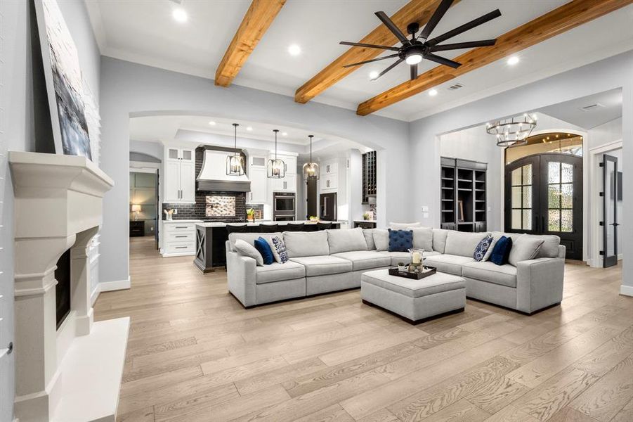 Beautiful open floor plan where no detail has been left unattended. Living room features 7" plank hardwood flooring, cedar beams, and high ceilings with crown molding