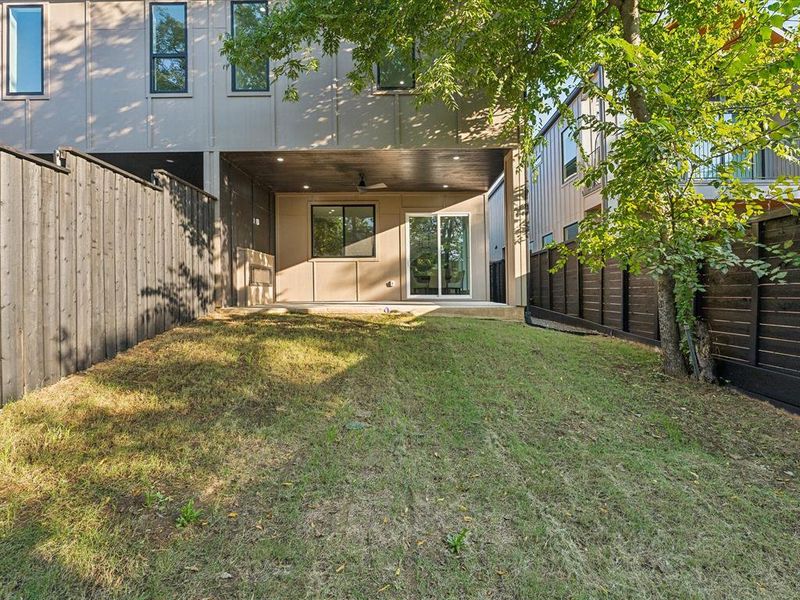 View of yard with a patio and ceiling fan