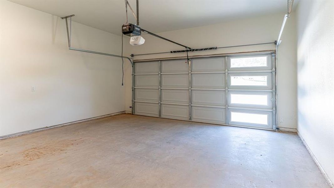 Garage with natural lighting in door