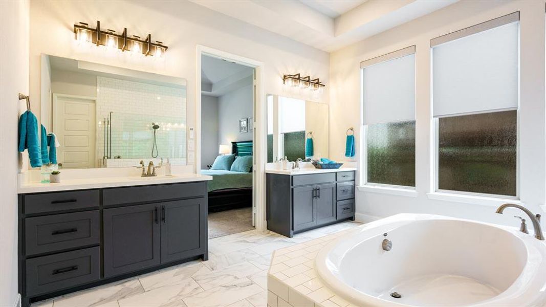 Soaking tub & dual vanities and auto blinds