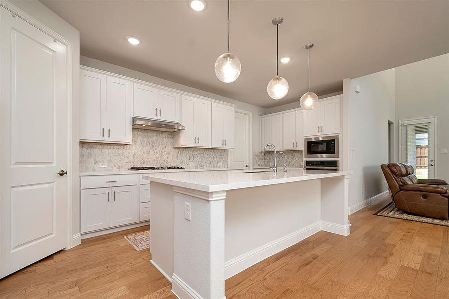 Gorgeous Kitchen featuring quartz counters and Stainless Appliances