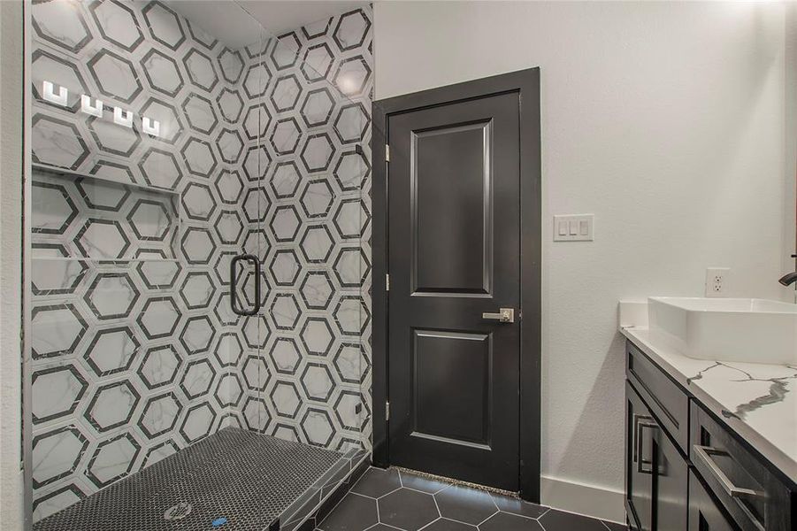 Bathroom with a shower and vanity