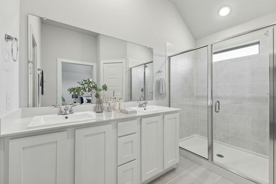 Primary Bathroom in the Amber home plan by Trophy Signature Homes – REPRESENTATIVE PHOTO