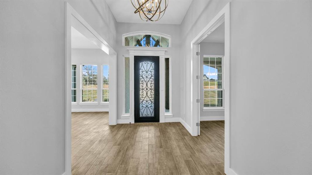 Unfurnished room featuring ceiling fan and wood-type flooring