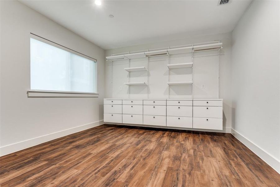 Spacious Bedroom feauting Custom Closet System