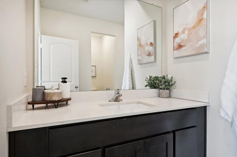 Bathroom featuring vanity