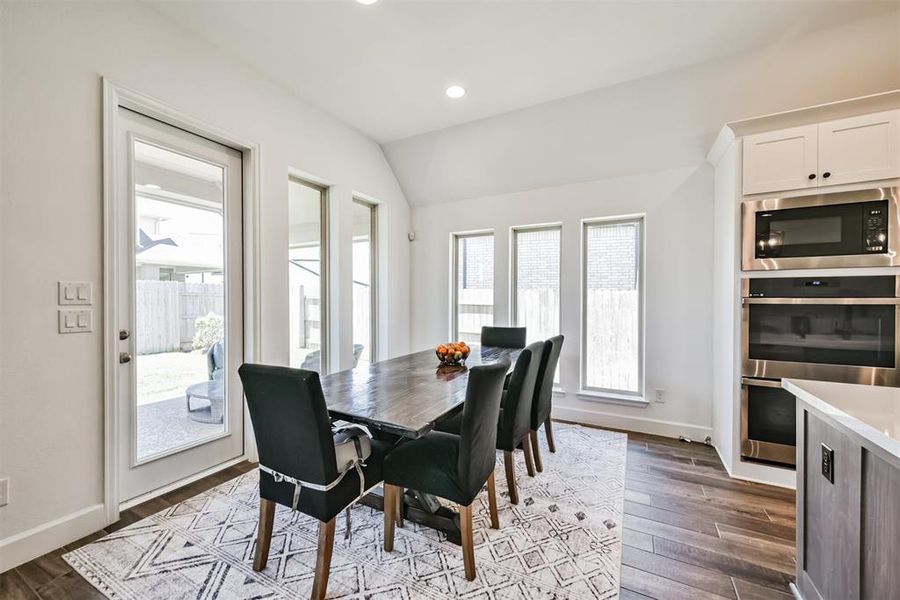 This thoughtfully designed homeseamlessly connects the kitchen witha charming breakfast area.