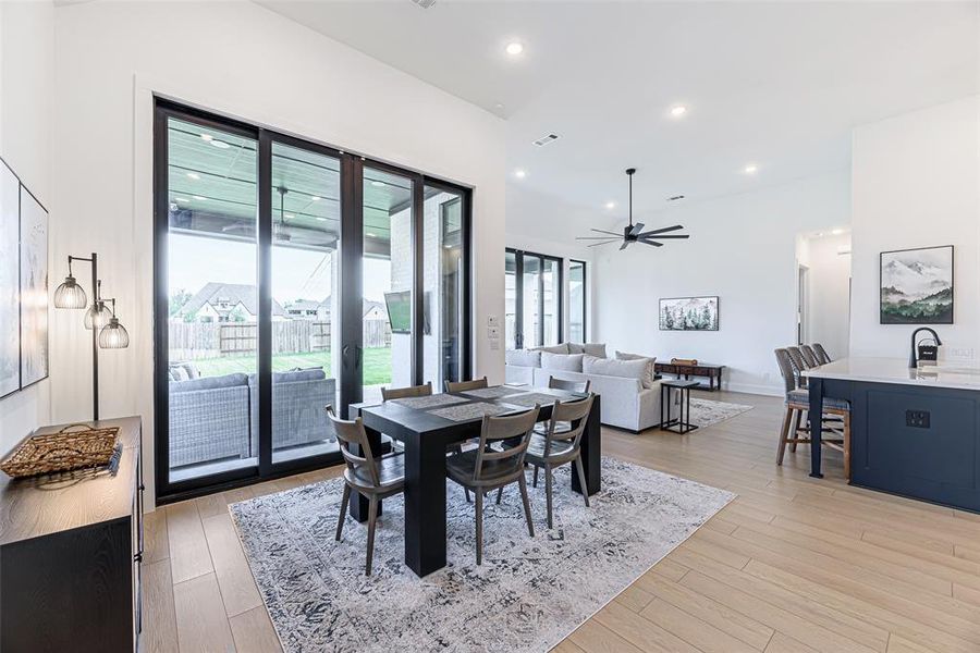 Formal dining with sliding glass doors to the covered patio.