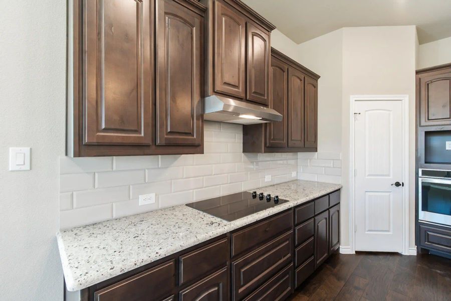 Kitchen | Concept 2440 at Silo Mills - Select Series in Joshua, TX by Landsea Homes