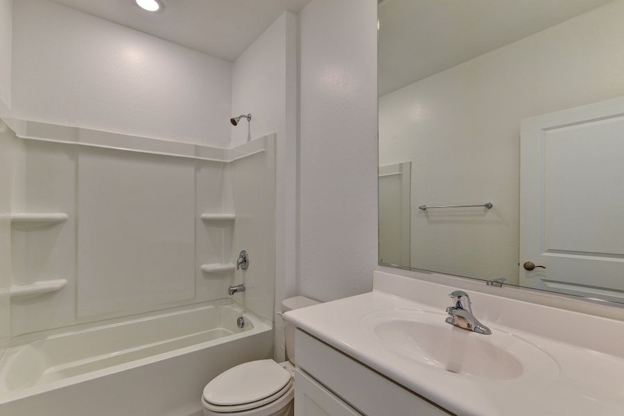 The Olive floorplans bathroom with spacious vanity.