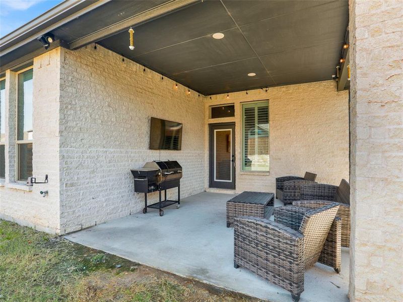 Covered patio with grilling area