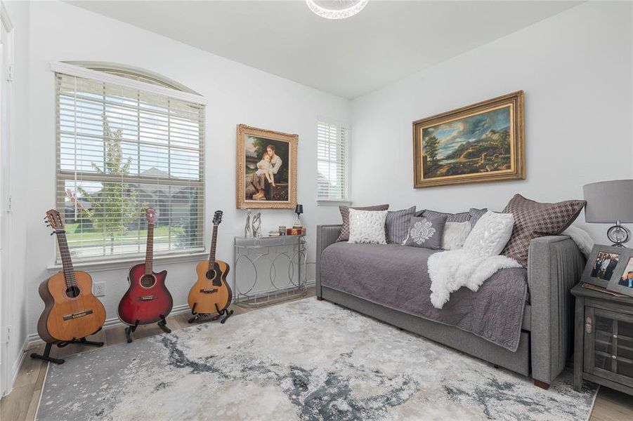 Bedroom featuring hardwood / wood-style flooring