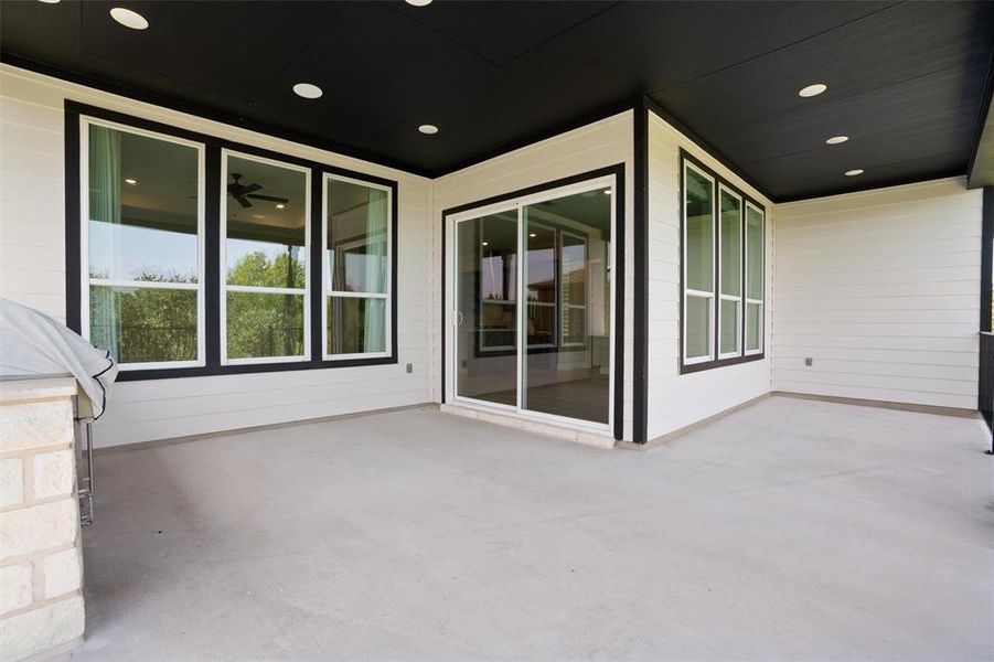 Extended and upgraded back patio w/ outdoor kitchen