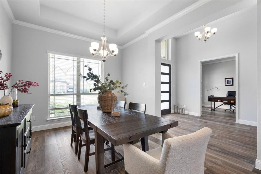 Dining area looking towards Office on right and front door in middle